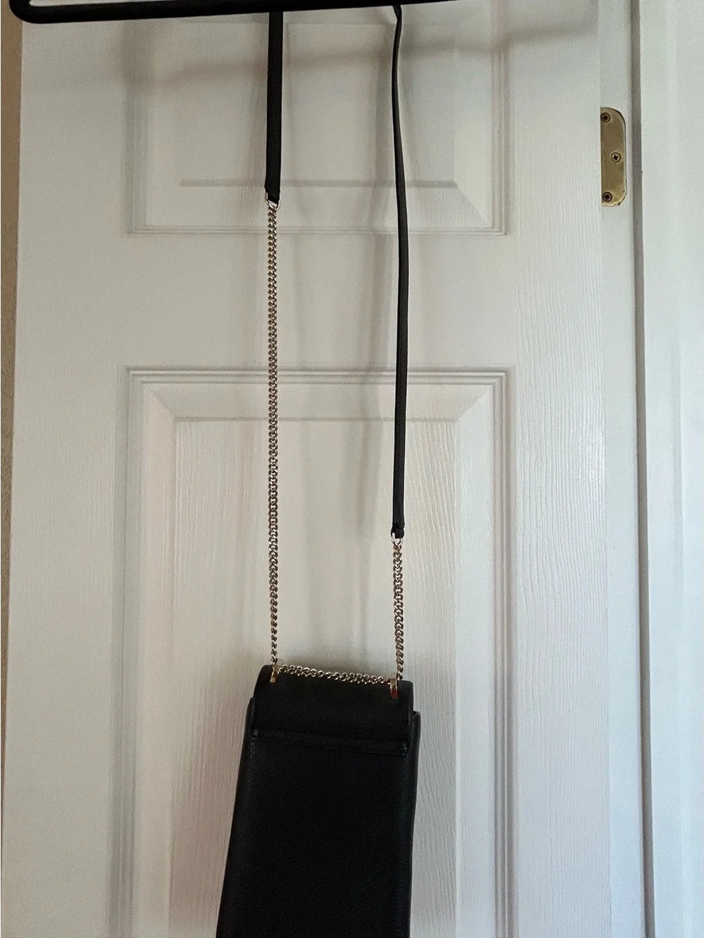 kate spade black pebbled leather phone crossbody with gold chain